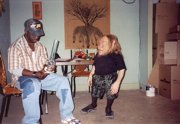 a bong, a black dude, a leprechaun. a bong, a black dude, a leprechaun.